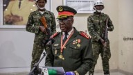 General sworn in as transitional leader of Guinea-Bissau as ousted president arrives in Senegal