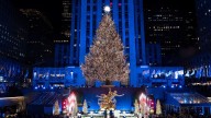 The Rockefeller Center Christmas tree, a holiday icon, is illuminated in New York