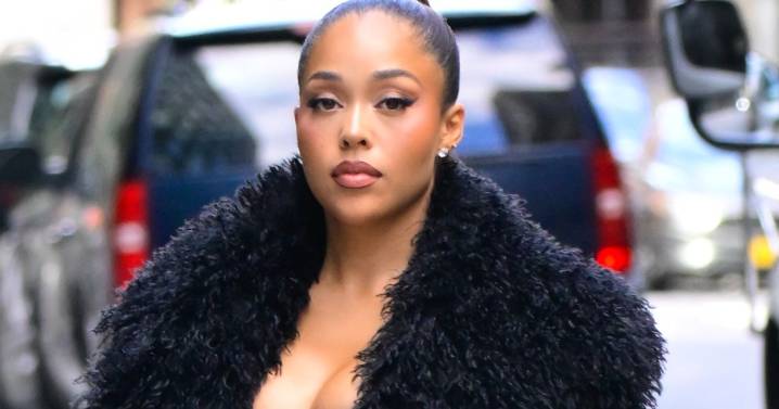Jordyn Woods Turns Heads in Sheer Bra & Fur Look