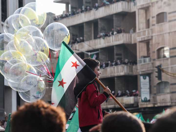 Hope, flags, fireworks as Syria starts to celebrate a year without al
