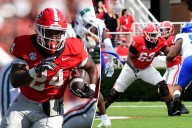 Two Georgia football players, including star freshman, arrested weeks before CFP game