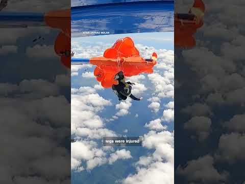 Skydiver left dangling from plane after parachute gets caught