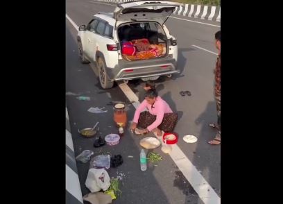Family turns road into kitchen; video of cooking on gas stove goes viral