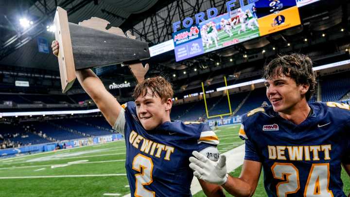 Traverse Moore's record finish powers DeWitt football to state title