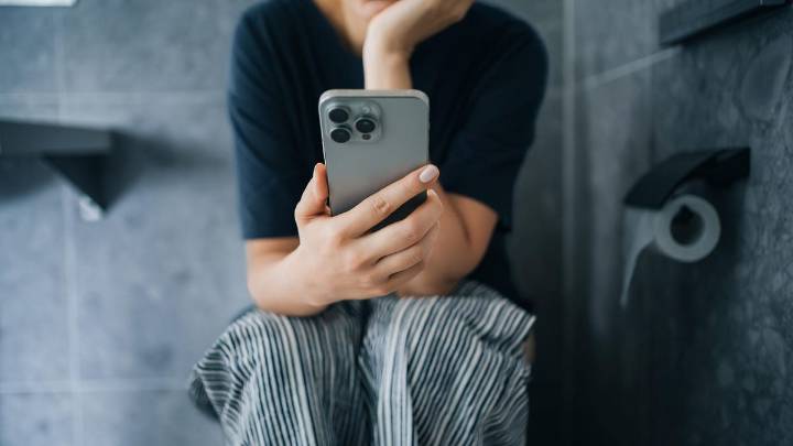 Checking Your Phone in the Bathroom Might Be Doing More Harm Than You Think