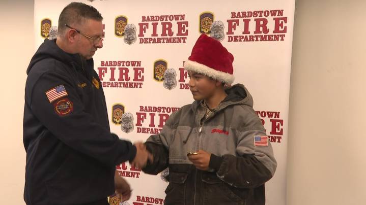 Bardstown teen saves brother from fire at Rogans Trailer Park, receives coin from fire department