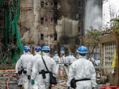 Hong Kong apartment fire probe reveals unsafe netting as public mourns
