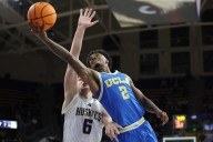 UCLA hangs on to beat Washington in Big Ten opener