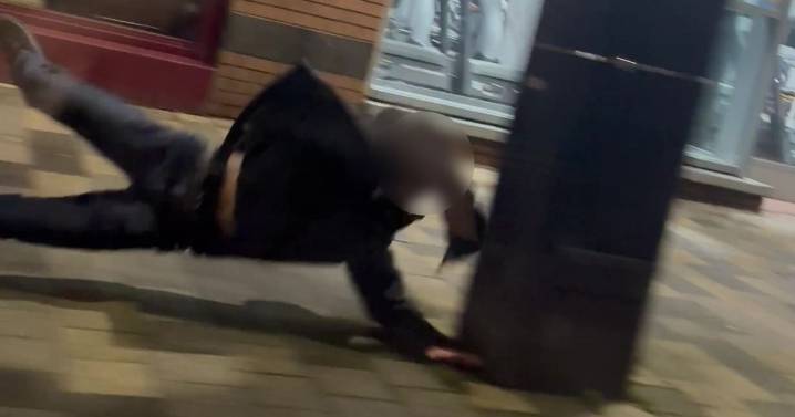 Suspect flees police with one shoe on and crashes headfirst into lamppost