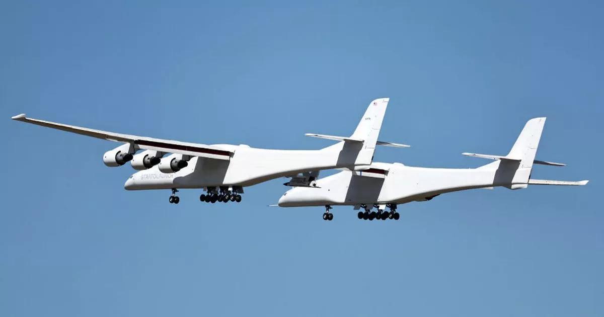 Astonished locals spot strange plane bigger than football field soaring above