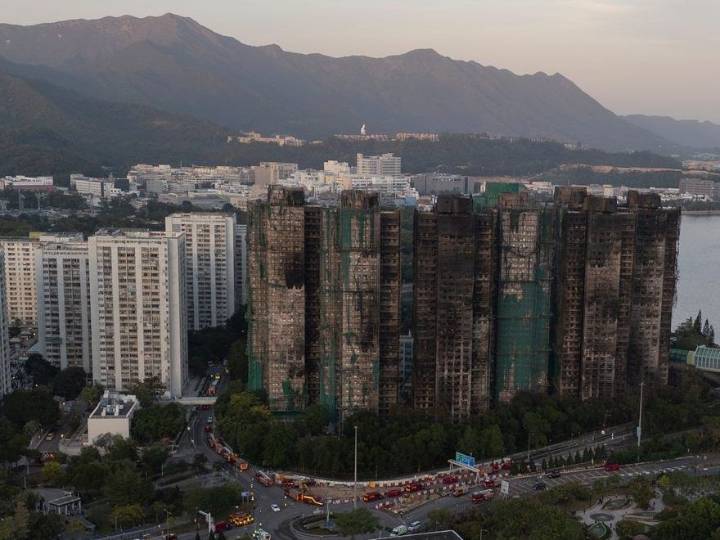 Hong Kong police arrest man for posts about deadly fire