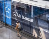 Air Transat limits fallout from strike threat, flight cancellations under two dozen