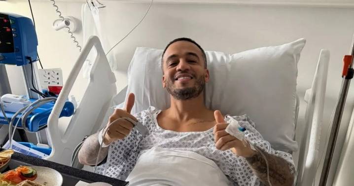 JLS' Aston Merrygold shares health update from hospital bed after operation