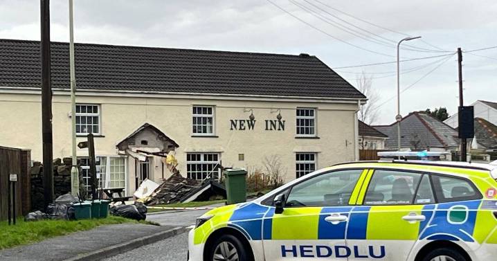 Bulldozer driven into UK village pub after flattening car in 'targeted attack'