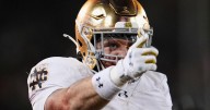 Love gets hurt but returns as No. 9 Notre Dame routs Stanford 49