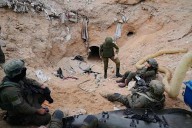 Israeli army takes journalists into a tunnel in a Gaza city it seized and largely flattened