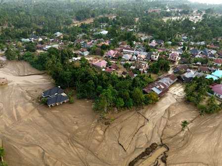 Indonesia flood, landslides kill over 1,000; hundreds missing