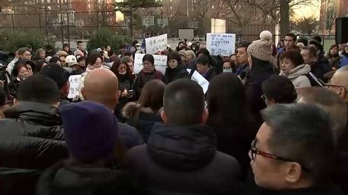 Candlelight vigil in Brooklyn honors victims of Hong Kong fire that killed more than 150 people