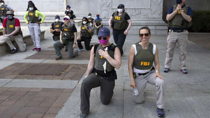 FBI agents sue after being fired for kneeling during racial justice protest