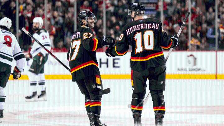 Flames score 3 in 3rd, end Wild's point streak at 12 games