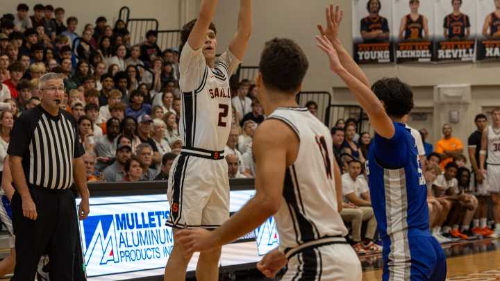 Sarasota boys basketball photos of in-school game win over IMG Black