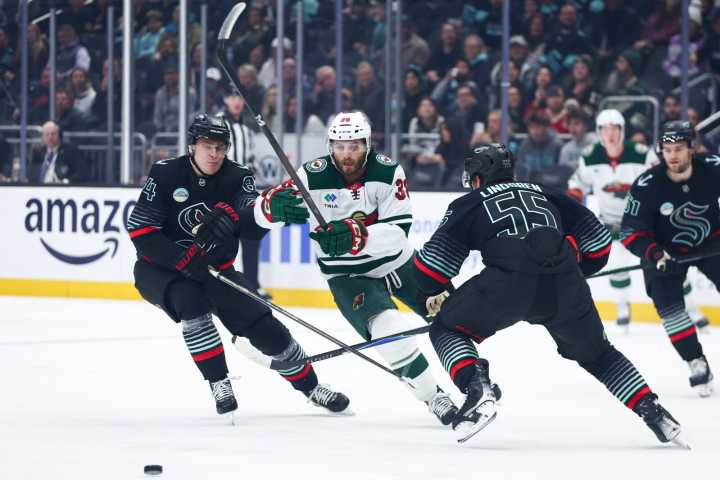 Wild survive slugfest in Seattle