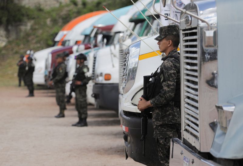 Honduran centrist holds narrow lead in presidential race marred by further delays