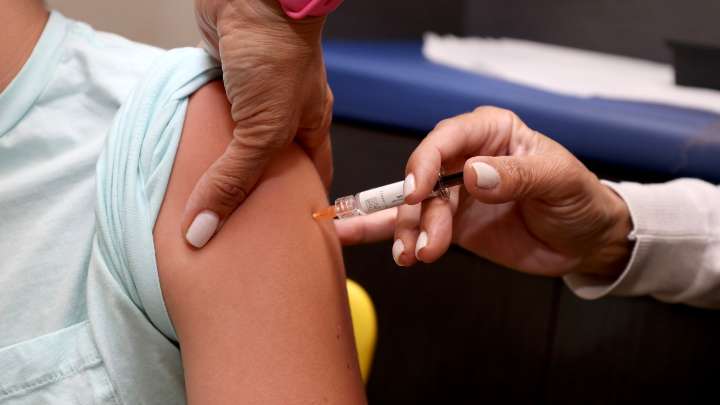 CDC advisers scrutinize childhood vaccine schedule : Shots