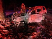 Michigan police officers save man trapped inside burning vehicle