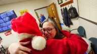 Secret Santas are back, handing cash to strangers in metro Detroit