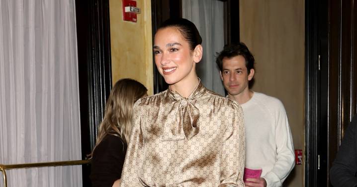 Dua Lipa Takes Logomania to Extremes in Head