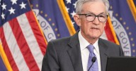 Federal Reserve cuts key rate, sees healthier economy next year