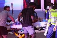 Eight hospitalised, two in custody after shooting at Sydney’s Bondi Beach