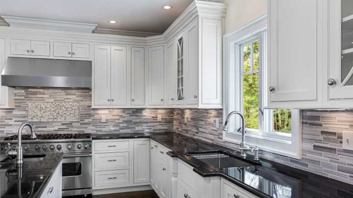 How To Fix Your Upper Cabinets So Your Kitchen Feels Less Cramped