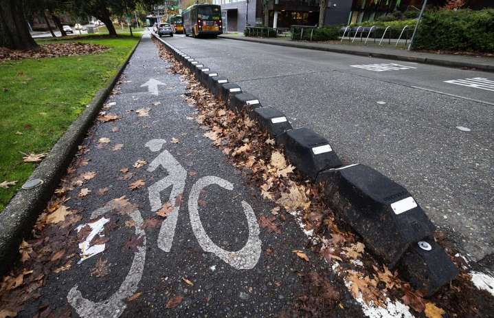 How Seattle’s new bike lanes are making the most of used car parts