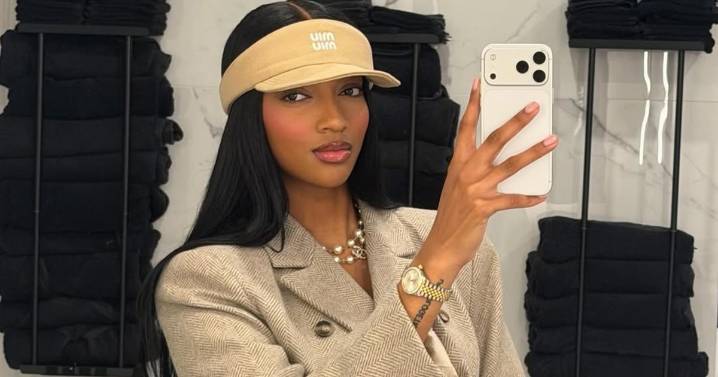 Angel Reese's Micro Shorts Are Almost Invisible Under Coat in Photos