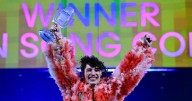 Eurovision winner Nemo hands back trophy as contest surrounded by controversy