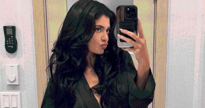 Photo: Kylie Jenner's Low-Cut Black Dress Is Double
