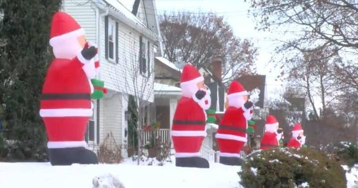 Inflatable Santas return to Monroe St. in Madison