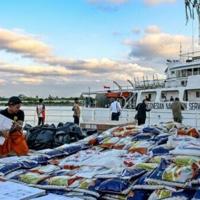 Race to get aid to Asia flood survivors as death toll tops 1,300