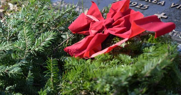 Hundreds of cities are placing Christmas wreaths on veterans' headstones for Wreaths Across America