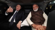 Modi and Putin ride together as India bets on Russia for missiles, oil and a US