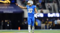 Chargers' Justin Herbert shows grit in OT win after hand surgery