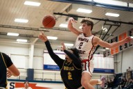 Powers Catholic overwhelms Bendle 77