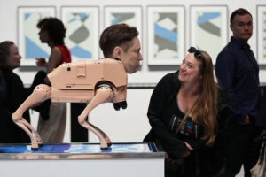 WATCH: Tech billionaires and artists are turned into robot dogs that will ‘poop’ images