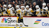 Crosby nears Lemieux's Penguins points mark, nets 2 vs. Flyers