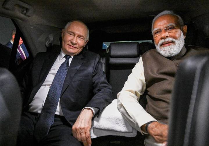 Putin maintains hard line in talks as Trump says Moscow is open to a deal