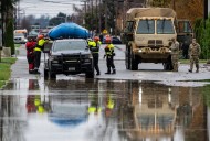 Arctic air plunges south as residents of the Pacific Northwest remain on guard after severe flooding