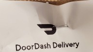 DoorDash driver accused of dousing delivery told authorities she was trying to pepper spray a spider