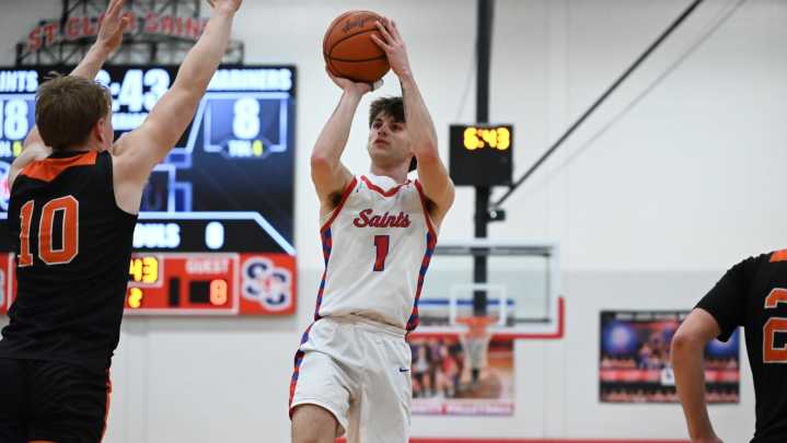 Photos: St. Clair boys basketball handles Marine City, 84